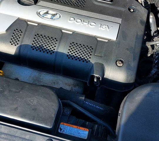 Зелений Хендай Туксон, об'ємом двигуна 2 л та пробігом 137 тис. км за 8500 $, фото 4 на Automoto.ua