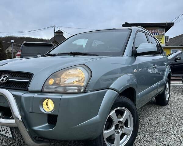 Зеленый Хендай Туксон, объемом двигателя 2 л и пробегом 190 тыс. км за 8450 $, фото 5 на Automoto.ua