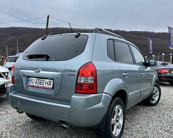 Зеленый Хендай Туксон, объемом двигателя 2 л и пробегом 190 тыс. км за 8450 $, фото 8 на Automoto.ua