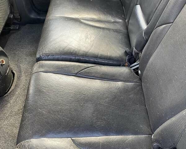 Зелений Хендай Туксон, об'ємом двигуна 1.98 л та пробігом 330 тис. км за 7000 $, фото 27 на Automoto.ua