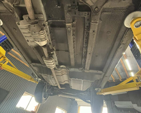 Зелений Хендай Туксон, об'ємом двигуна 2.02 л та пробігом 239 тис. км за 7800 $, фото 5 на Automoto.ua