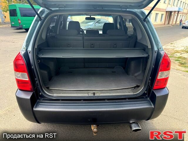 Зеленый Хендай Туксон, объемом двигателя 2 л и пробегом 234 тыс. км за 7999 $, фото 9 на Automoto.ua