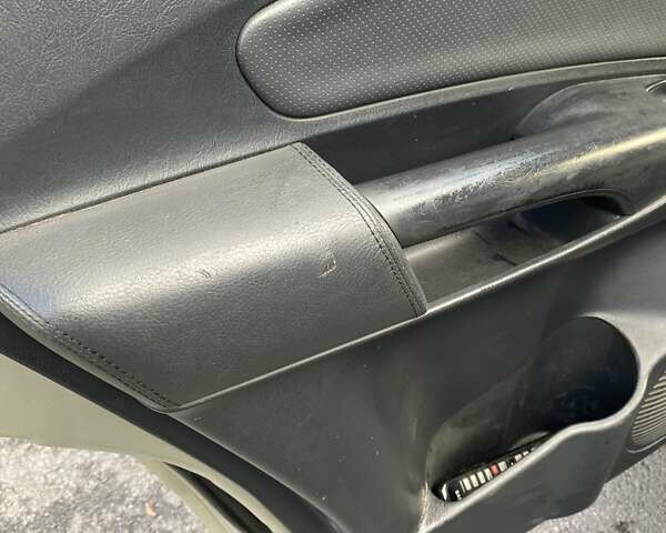 Зелений Хендай Туксон, об'ємом двигуна 1.98 л та пробігом 330 тис. км за 7000 $, фото 21 на Automoto.ua