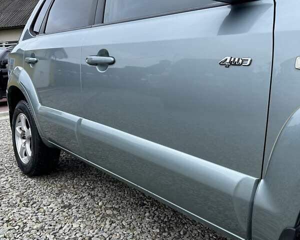 Зеленый Хендай Туксон, объемом двигателя 2 л и пробегом 190 тыс. км за 8450 $, фото 17 на Automoto.ua