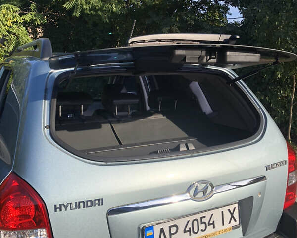 Зелений Хендай Туксон, об'ємом двигуна 1.98 л та пробігом 105 тис. км за 9200 $, фото 26 на Automoto.ua