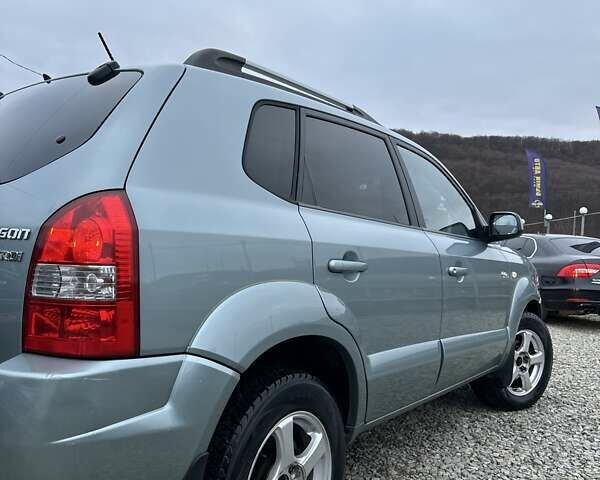 Зеленый Хендай Туксон, объемом двигателя 2 л и пробегом 190 тыс. км за 8450 $, фото 11 на Automoto.ua