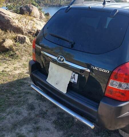 Зеленый Хендай Туксон, объемом двигателя 2 л и пробегом 137 тыс. км за 8500 $, фото 30 на Automoto.ua