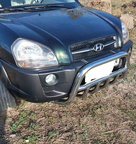 Зеленый Хендай Туксон, объемом двигателя 2 л и пробегом 137 тыс. км за 8500 $, фото 21 на Automoto.ua