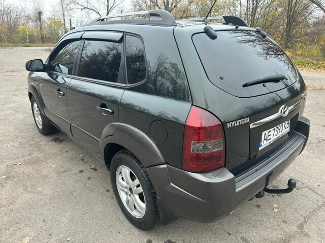 Зеленый Хендай Туксон, объемом двигателя 2.7 л и пробегом 250 тыс. км за 7850 $, фото 3 на Automoto.ua