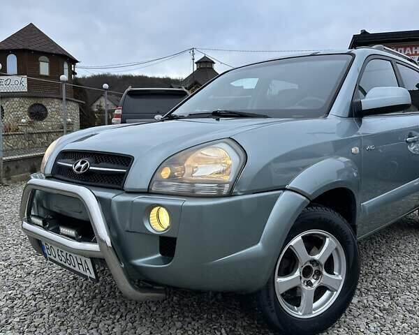 Зеленый Хендай Туксон, объемом двигателя 2 л и пробегом 190 тыс. км за 8450 $, фото 4 на Automoto.ua