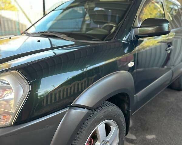 Зелений Хендай Туксон, об'ємом двигуна 1.98 л та пробігом 188 тис. км за 7900 $, фото 3 на Automoto.ua