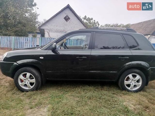 Зеленый Хендай Туксон, объемом двигателя 1.98 л и пробегом 310 тыс. км за 6200 $, фото 8 на Automoto.ua