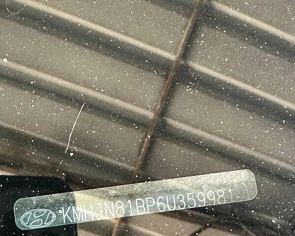 Зелений Хендай Туксон, об'ємом двигуна 1.98 л та пробігом 188 тис. км за 7900 $, фото 7 на Automoto.ua