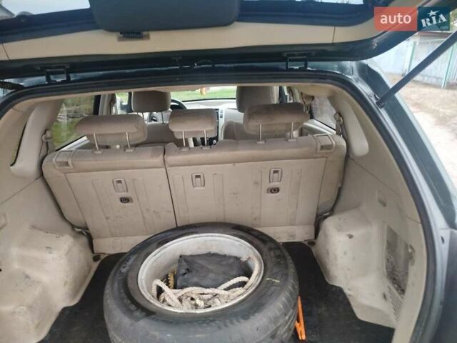 Зеленый Хендай Туксон, объемом двигателя 1.98 л и пробегом 310 тыс. км за 6200 $, фото 2 на Automoto.ua