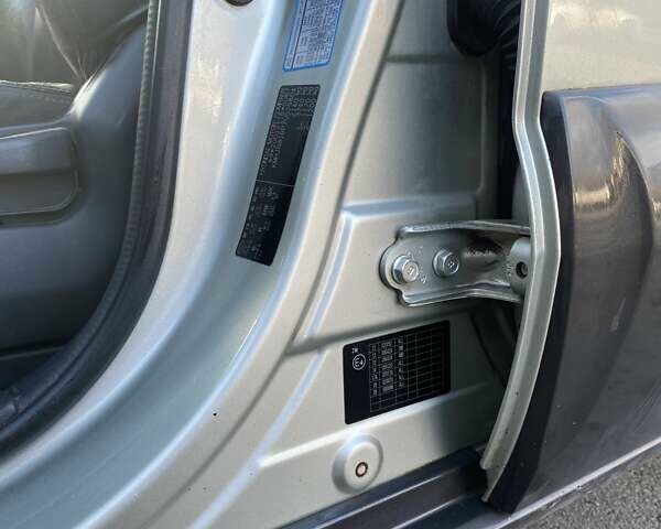 Зелений Хендай Туксон, об'ємом двигуна 1.98 л та пробігом 330 тис. км за 7000 $, фото 34 на Automoto.ua