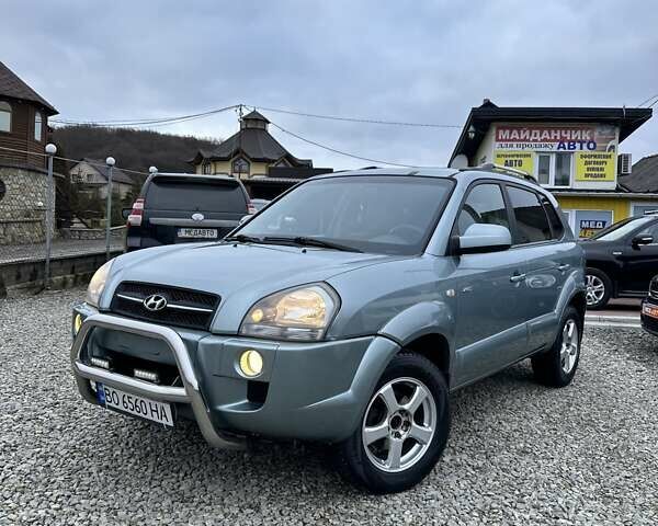 Зеленый Хендай Туксон, объемом двигателя 2 л и пробегом 190 тыс. км за 8450 $, фото 1 на Automoto.ua