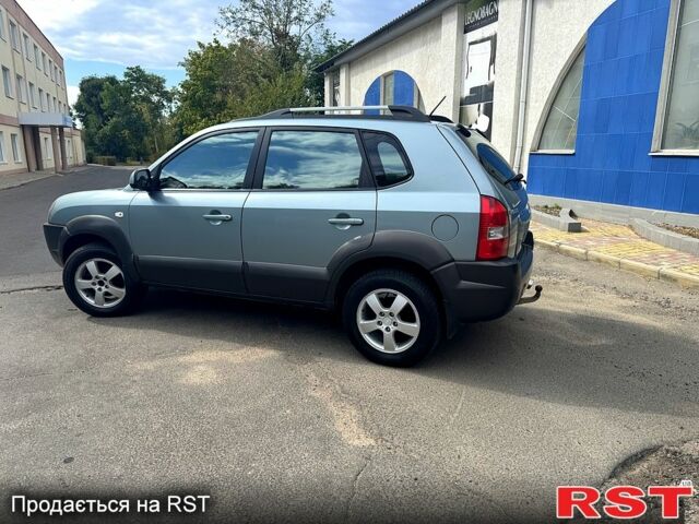 Зеленый Хендай Туксон, объемом двигателя 2 л и пробегом 234 тыс. км за 7999 $, фото 5 на Automoto.ua