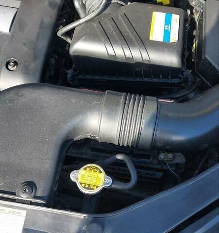 Зелений Хендай Туксон, об'ємом двигуна 2 л та пробігом 137 тис. км за 8500 $, фото 7 на Automoto.ua