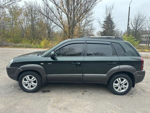 Зеленый Хендай Туксон, объемом двигателя 2.7 л и пробегом 250 тыс. км за 7850 $, фото 2 на Automoto.ua