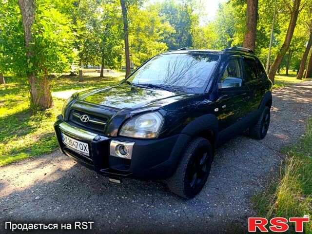 Зеленый Хендай Туксон, объемом двигателя 2 л и пробегом 210 тыс. км за 7699 $, фото 1 на Automoto.ua