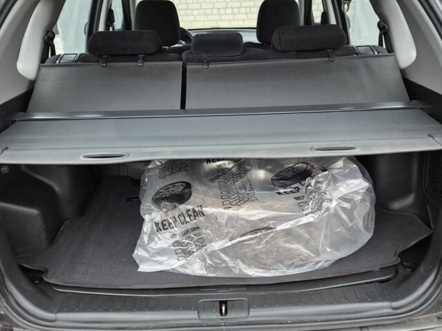 Зеленый Хендай Туксон, объемом двигателя 2 л и пробегом 241 тыс. км за 6900 $, фото 7 на Automoto.ua