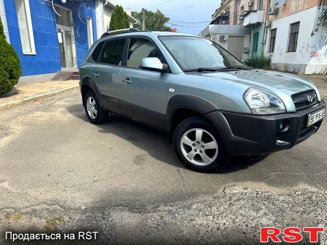 Зеленый Хендай Туксон, объемом двигателя 2 л и пробегом 234 тыс. км за 7999 $, фото 2 на Automoto.ua