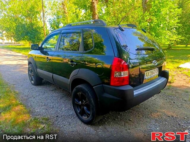 Зеленый Хендай Туксон, объемом двигателя 2 л и пробегом 210 тыс. км за 7699 $, фото 6 на Automoto.ua