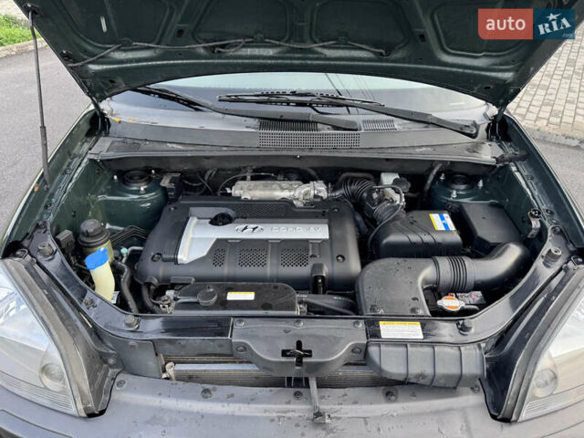 Хендай Туксон 2006 в Полтаве на Automoto.ua Зеленый Хендай Туксон, объемом двигателя 2 л и пробегом 221 тыс. км за 8299 $, фото 27 на Automoto.ua