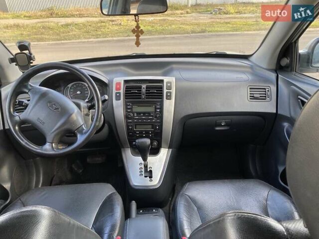 Зелений Хендай Туксон, об'ємом двигуна 1.98 л та пробігом 330 тис. км за 7000 $, фото 17 на Automoto.ua