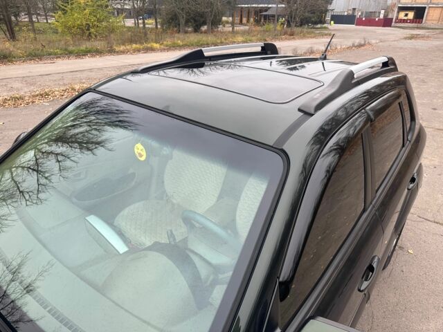 Зеленый Хендай Туксон, объемом двигателя 2.7 л и пробегом 250 тыс. км за 7850 $, фото 8 на Automoto.ua