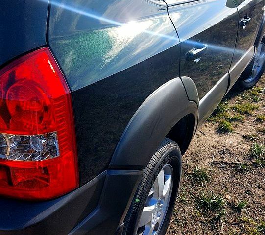 Зелений Хендай Туксон, об'ємом двигуна 2 л та пробігом 137 тис. км за 8500 $, фото 10 на Automoto.ua