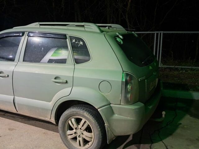 Зеленый Хендай Туксон, объемом двигателя 2 л и пробегом 380 тыс. км за 3500 $, фото 1 на Automoto.ua