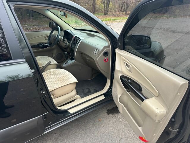 Зеленый Хендай Туксон, объемом двигателя 2.7 л и пробегом 250 тыс. км за 7850 $, фото 16 на Automoto.ua