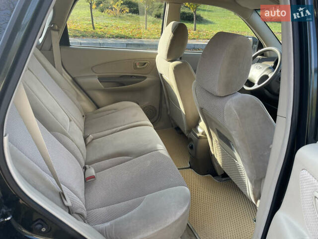 Зеленый Хендай Туксон, объемом двигателя 1.99 л и пробегом 208 тыс. км за 7600 $, фото 10 на Automoto.ua