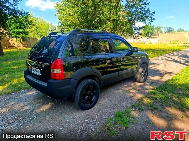 Зеленый Хендай Туксон, объемом двигателя 2 л и пробегом 210 тыс. км за 7699 $, фото 4 на Automoto.ua