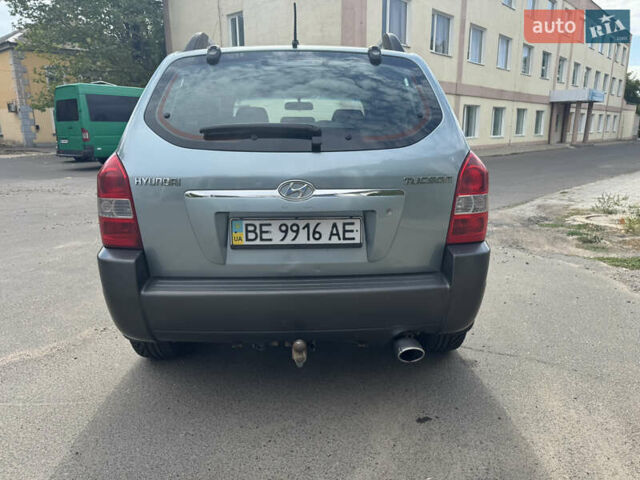 Зелений Хендай Туксон, об'ємом двигуна 1.98 л та пробігом 234 тис. км за 7800 $, фото 6 на Automoto.ua
