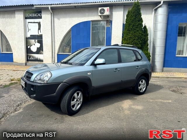 Зеленый Хендай Туксон, объемом двигателя 2 л и пробегом 234 тыс. км за 7999 $, фото 1 на Automoto.ua