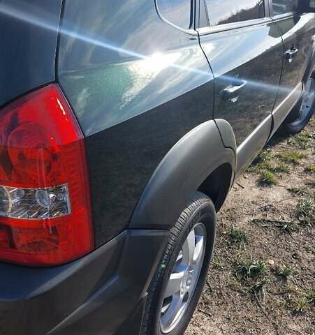 Зеленый Хендай Туксон, объемом двигателя 2 л и пробегом 137 тыс. км за 8500 $, фото 20 на Automoto.ua