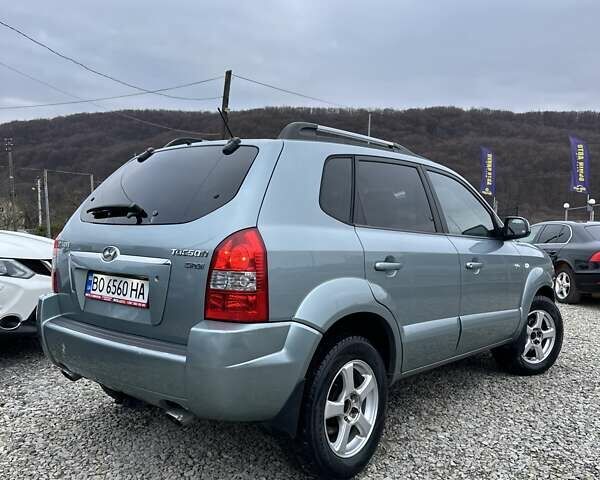 Зеленый Хендай Туксон, объемом двигателя 2 л и пробегом 190 тыс. км за 8450 $, фото 10 на Automoto.ua