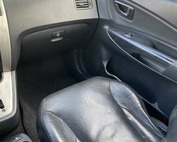 Зелений Хендай Туксон, об'ємом двигуна 1.98 л та пробігом 330 тис. км за 7000 $, фото 16 на Automoto.ua