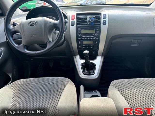 Зеленый Хендай Туксон, объемом двигателя 2 л и пробегом 234 тыс. км за 7999 $, фото 8 на Automoto.ua