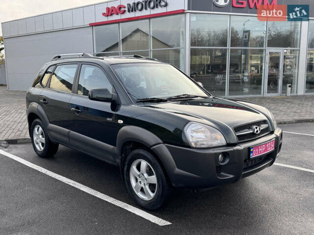 Зеленый Хендай Туксон, объемом двигателя 2 л и пробегом 221 тыс. км за 8199 $, фото 3 на Automoto.ua