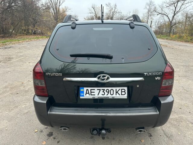Зеленый Хендай Туксон, объемом двигателя 2.7 л и пробегом 250 тыс. км за 7850 $, фото 4 на Automoto.ua