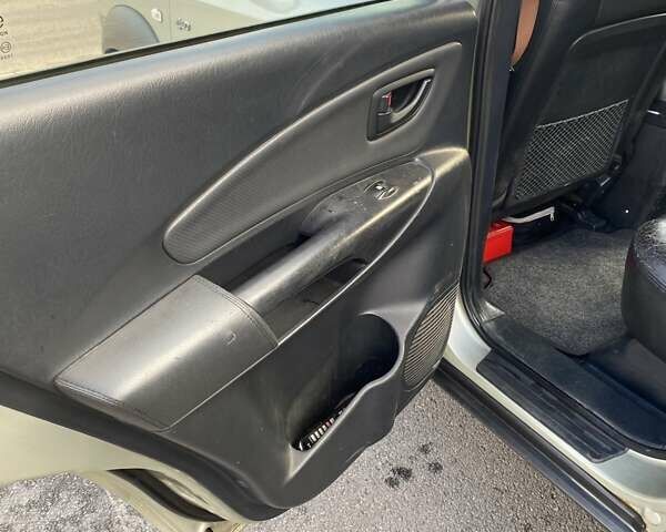 Зелений Хендай Туксон, об'ємом двигуна 1.98 л та пробігом 330 тис. км за 7000 $, фото 23 на Automoto.ua