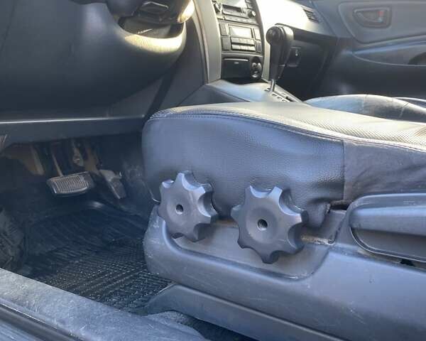 Зелений Хендай Туксон, об'ємом двигуна 1.98 л та пробігом 330 тис. км за 7000 $, фото 37 на Automoto.ua