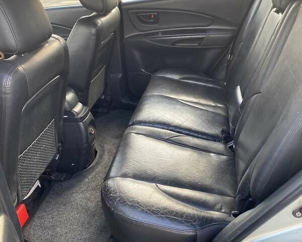 Зелений Хендай Туксон, об'ємом двигуна 1.98 л та пробігом 330 тис. км за 7000 $, фото 26 на Automoto.ua