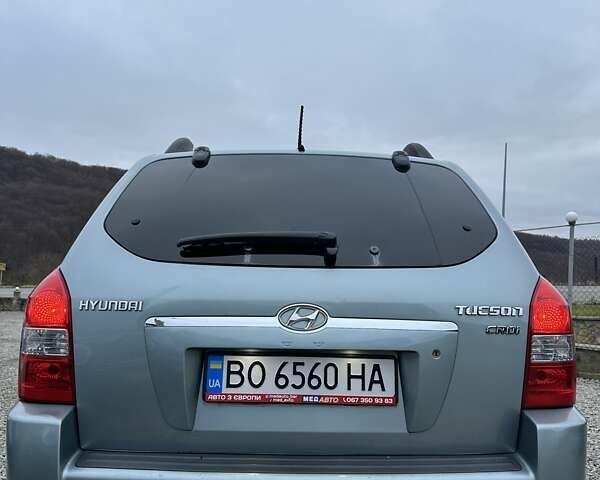 Зеленый Хендай Туксон, объемом двигателя 2 л и пробегом 190 тыс. км за 8450 $, фото 7 на Automoto.ua
