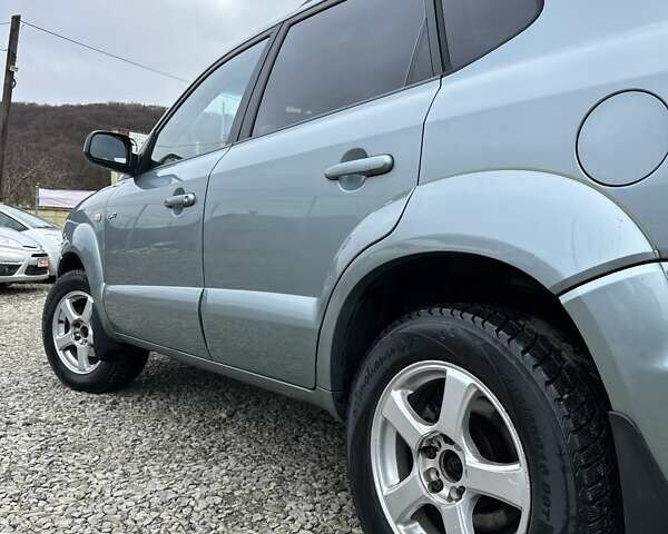 Зеленый Хендай Туксон, объемом двигателя 2 л и пробегом 190 тыс. км за 8450 $, фото 27 на Automoto.ua