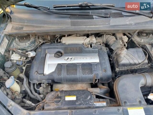 Зелений Хендай Туксон, об'ємом двигуна 1.98 л та пробігом 185 тис. км за 8100 $, фото 40 на Automoto.ua