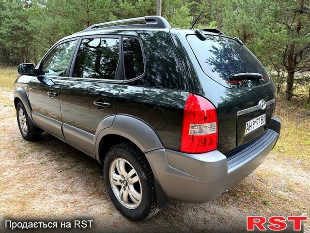 Зеленый Хендай Туксон, объемом двигателя 2 л и пробегом 185 тыс. км за 7950 $, фото 2 на Automoto.ua